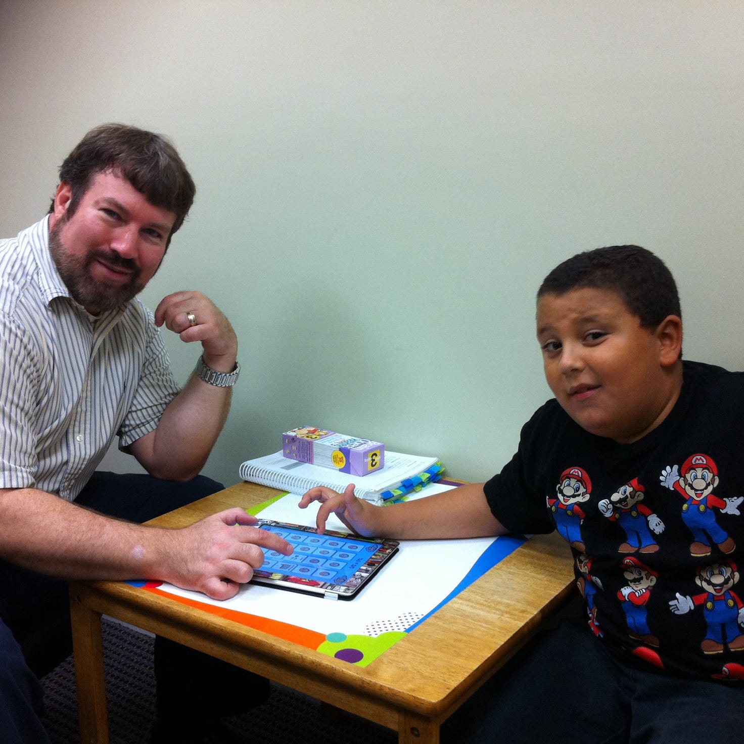 Male employer gesticulating and explaining idea in light office